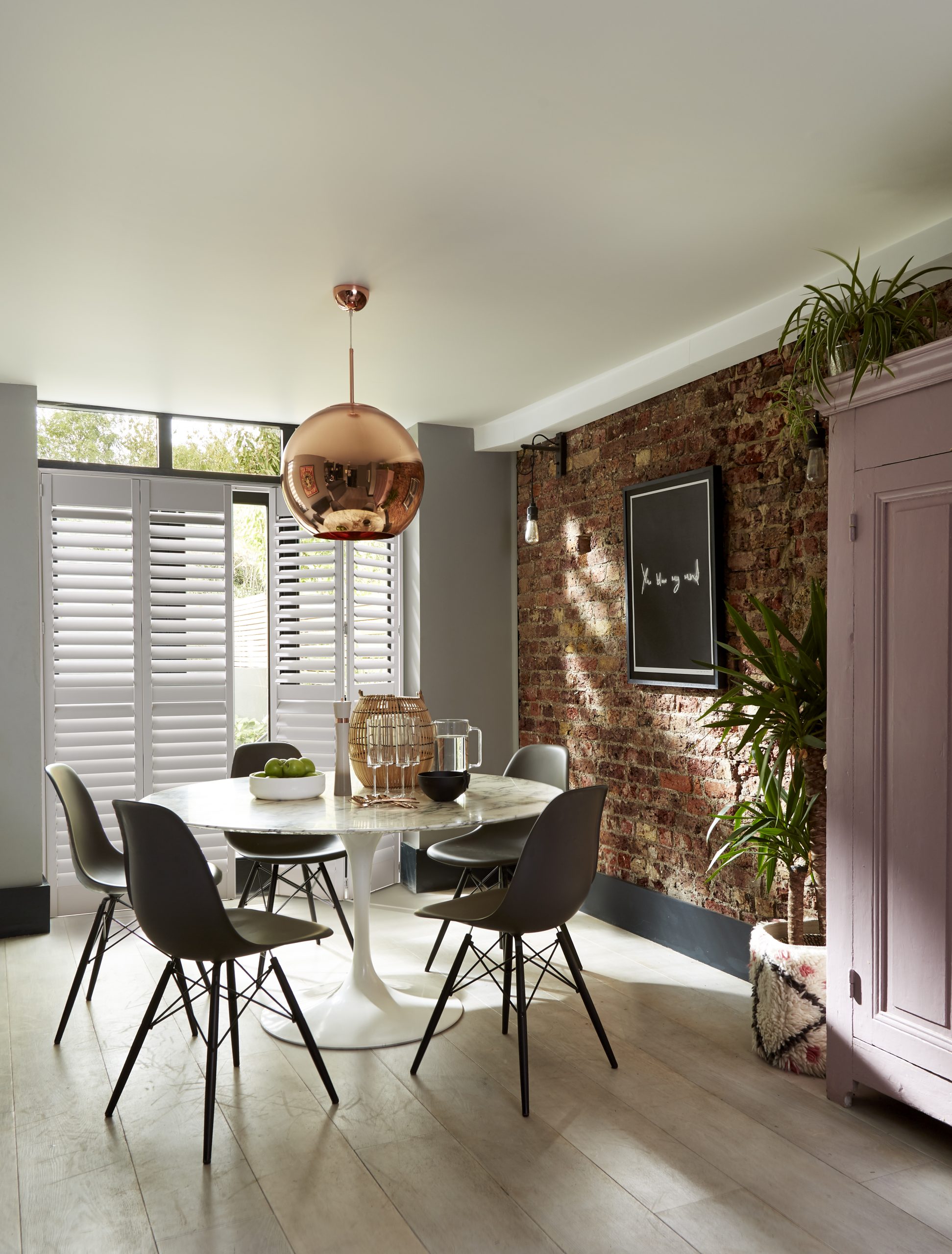 shutter panels in modern dining room 